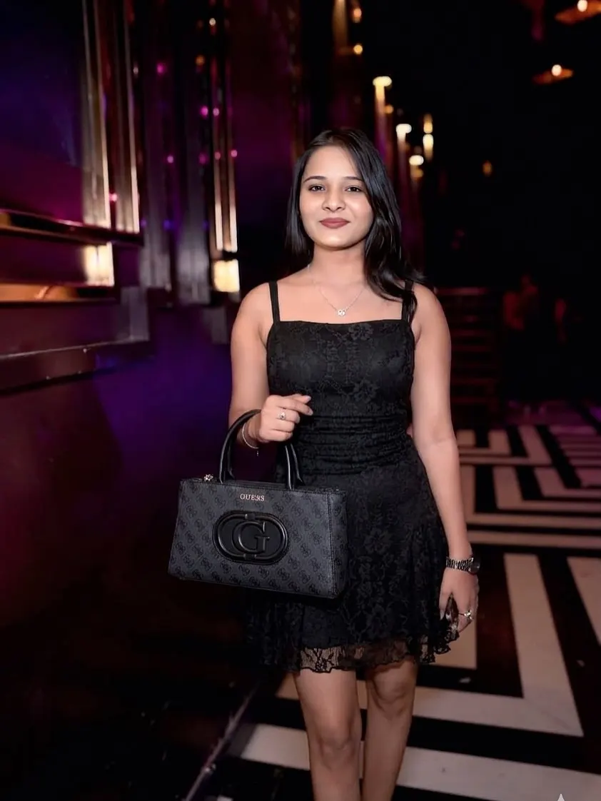 Nitya Shukla in a black dress on a night out